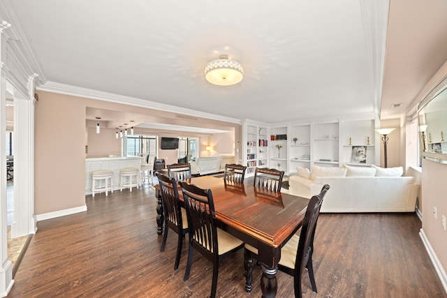 dining space with ornamental molding, dark wood-type flooring, and built in shelves