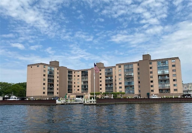 view of building exterior featuring a water view