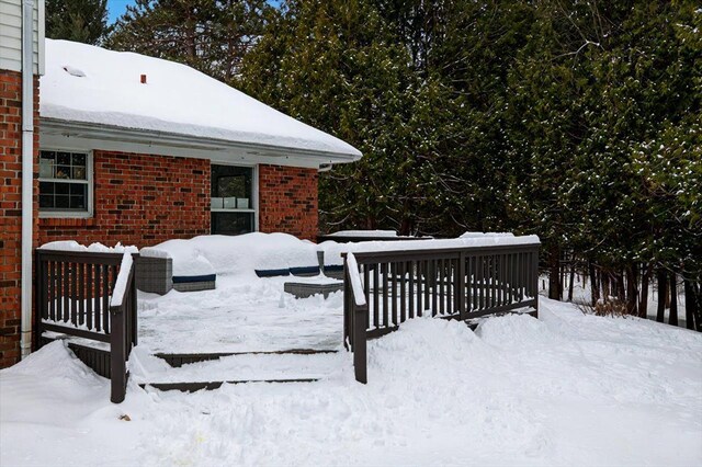 view of snow covered deck