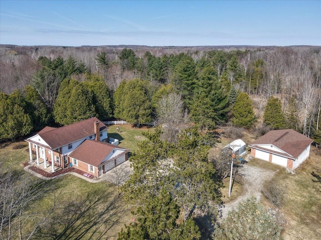 aerial view with a wooded view