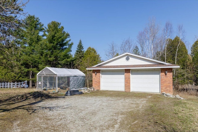 detached garage with fence