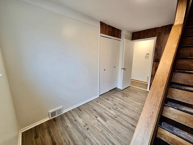 interior space with a closet and light wood-type flooring