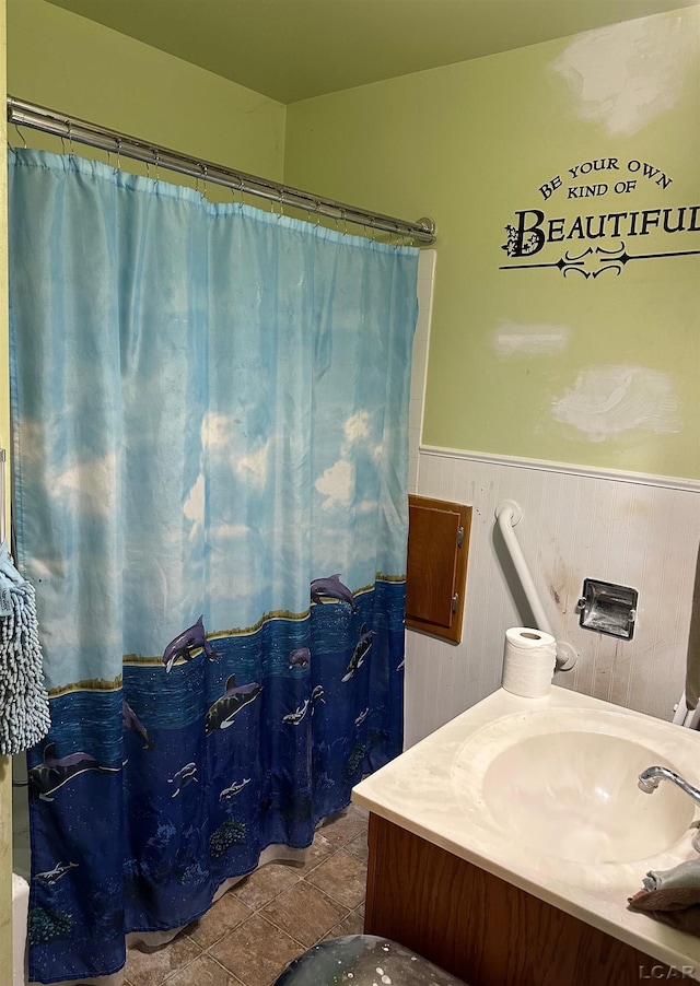 bathroom with vanity and walk in shower