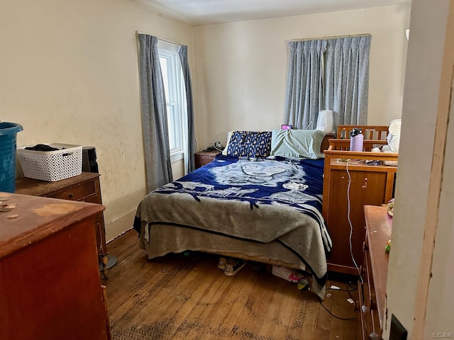 bedroom featuring hardwood / wood-style flooring