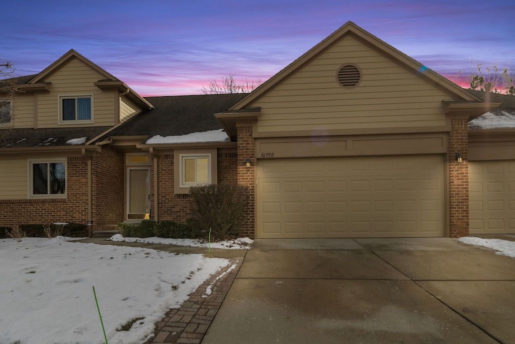 view of front of property featuring a garage