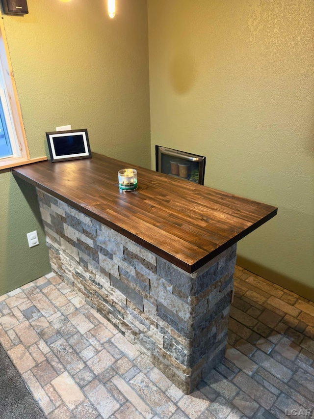 bar featuring butcher block countertops