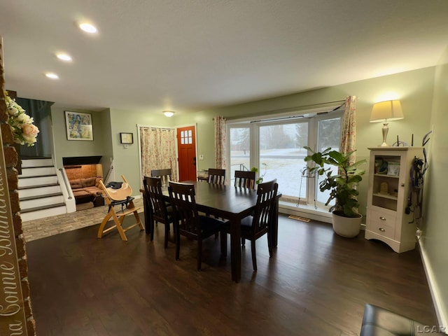 dining area featuring dark hardwood / wood-style floors