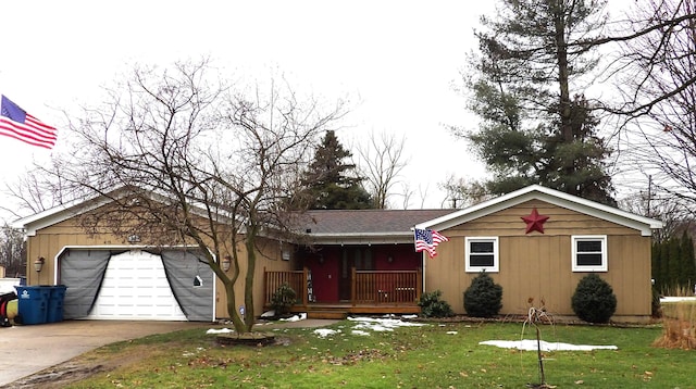 ranch-style home with a garage and a front yard