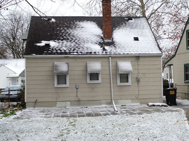 view of snow covered property