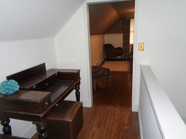 office area with lofted ceiling and dark wood-type flooring