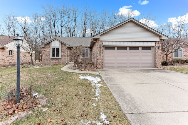 ranch-style house with a garage and a front yard