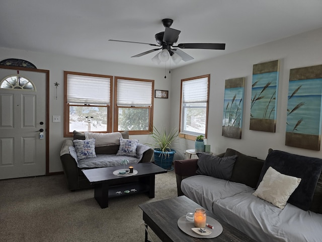 carpeted living room featuring ceiling fan