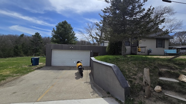 exterior space featuring a garage and a front yard