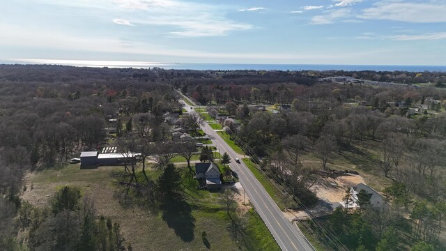 bird's eye view featuring a forest view