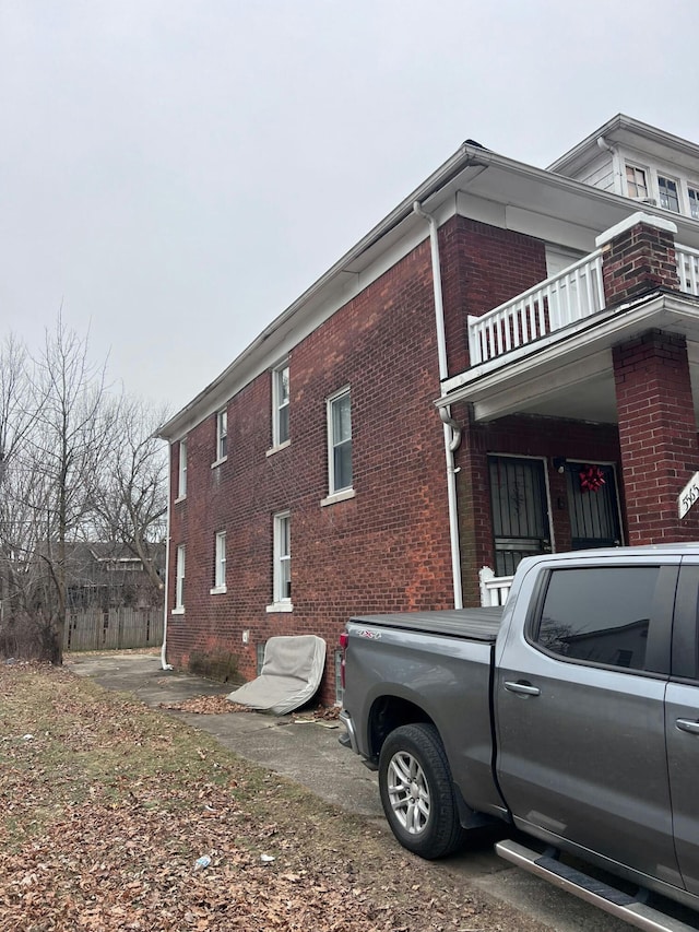 view of property exterior with a balcony