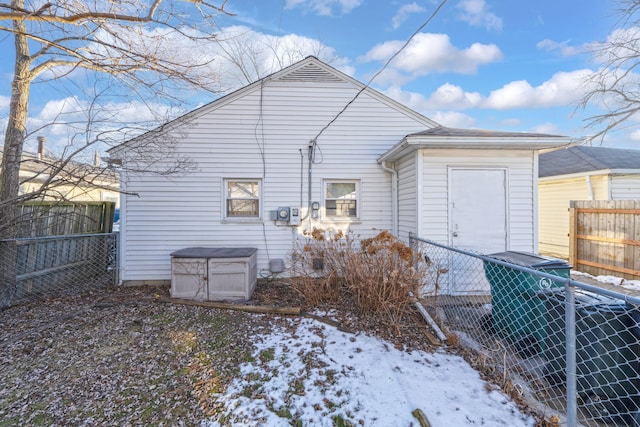 view of snow covered house