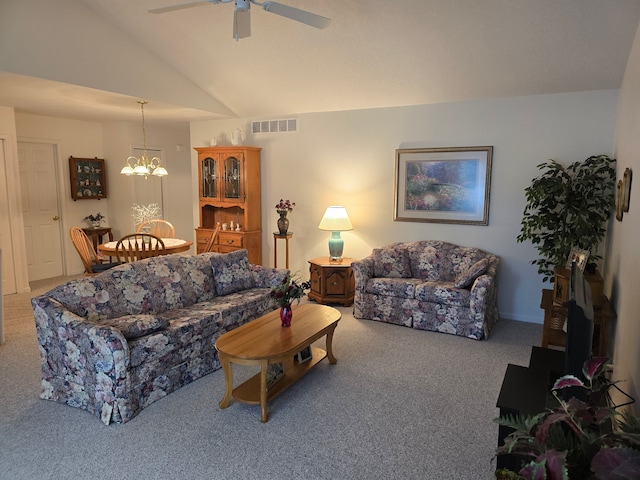 living room with vaulted ceiling, carpet flooring, and ceiling fan with notable chandelier