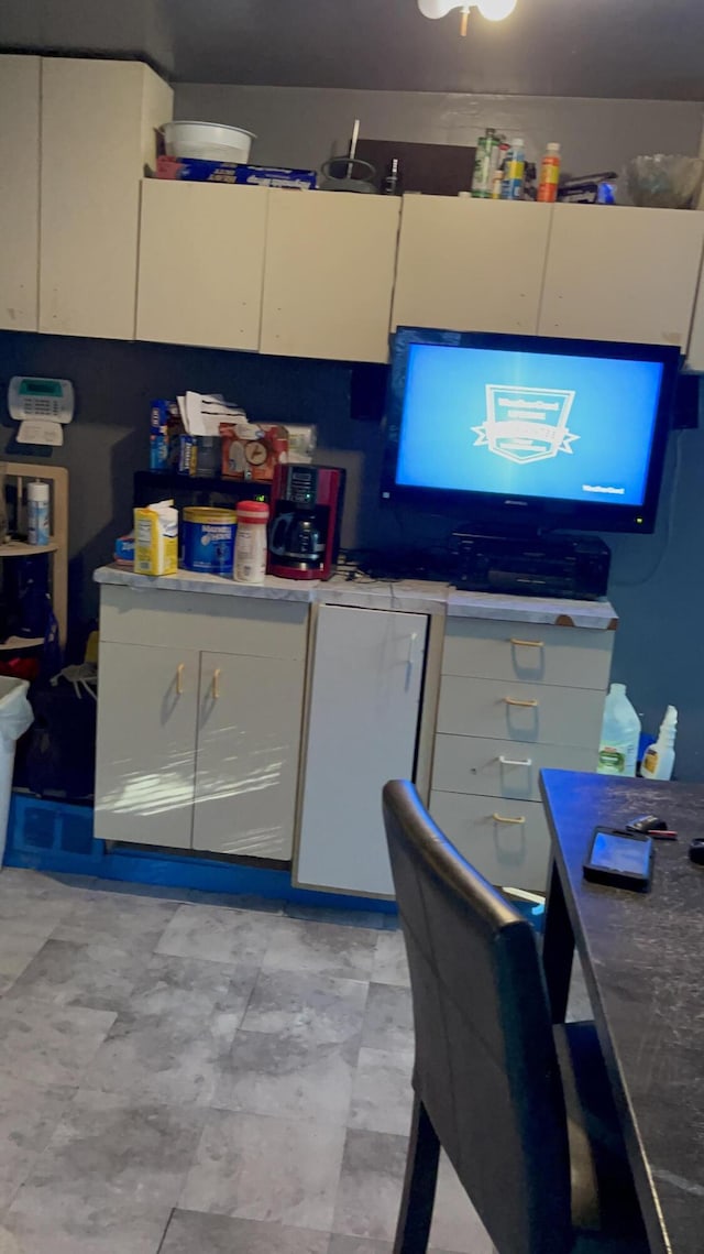 kitchen with white cabinetry