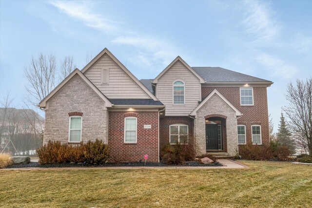 view of front property with a front lawn