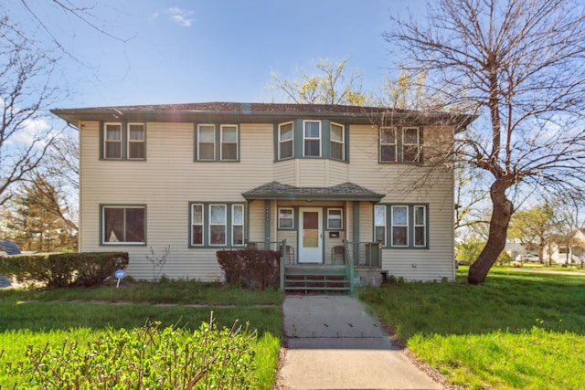 view of front of home with a front lawn