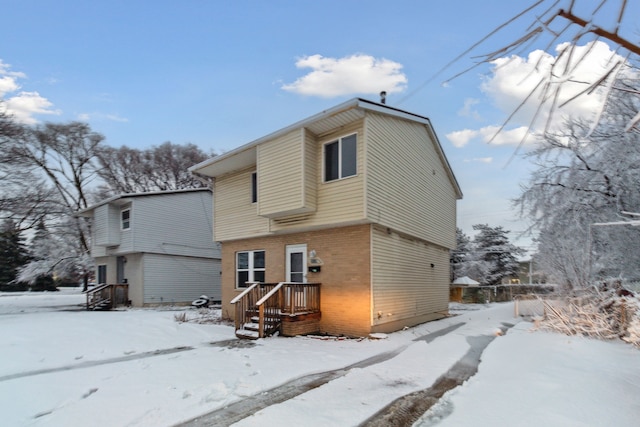 view of snow covered property