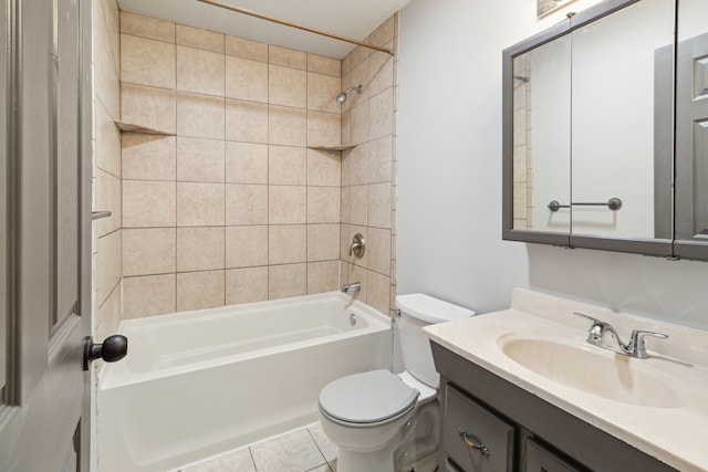 full bathroom with vanity, tile patterned floors, toilet, and tiled shower / bath