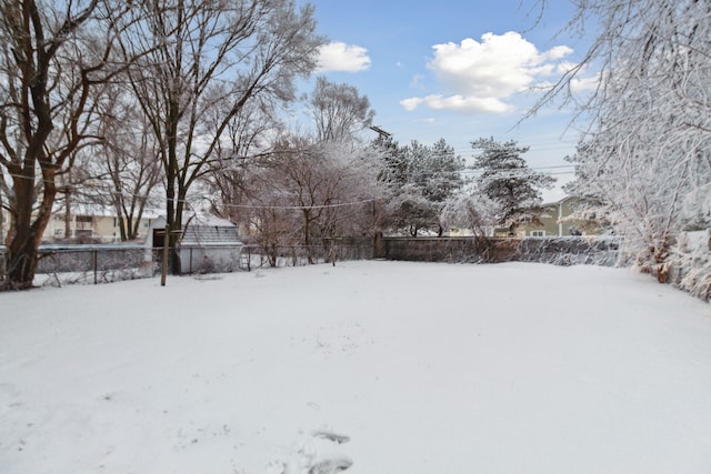 view of yard covered in snow