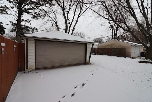 view of snow covered garage