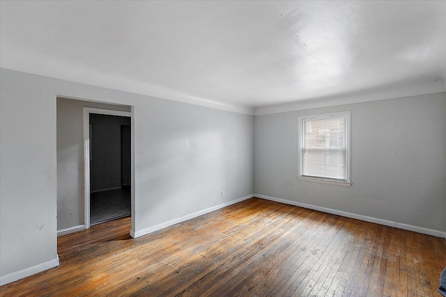 unfurnished room featuring wood-type flooring