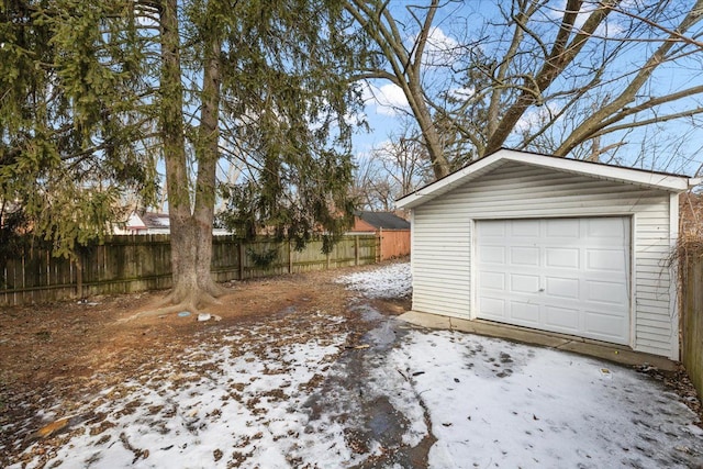 view of snow covered garage