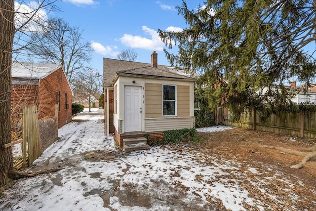 view of snow covered house