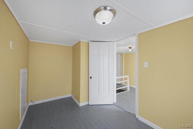 spare room with hardwood / wood-style flooring