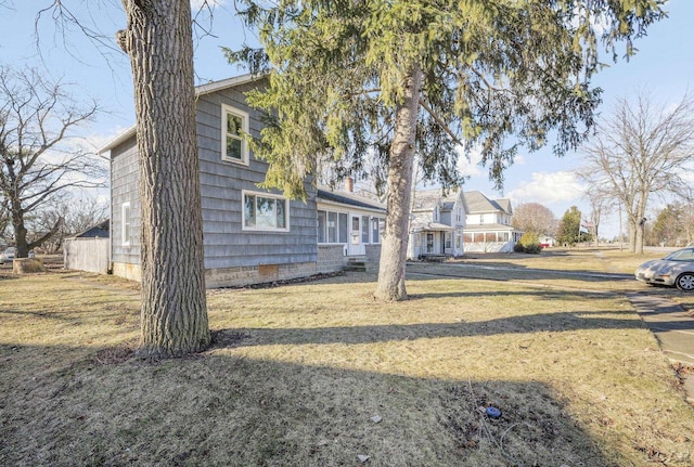 exterior space featuring a front lawn