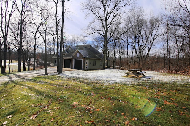 view of yard featuring a garage