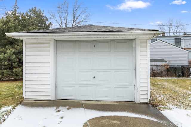 view of snow covered garage