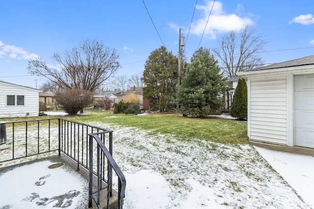 view of yard covered in snow