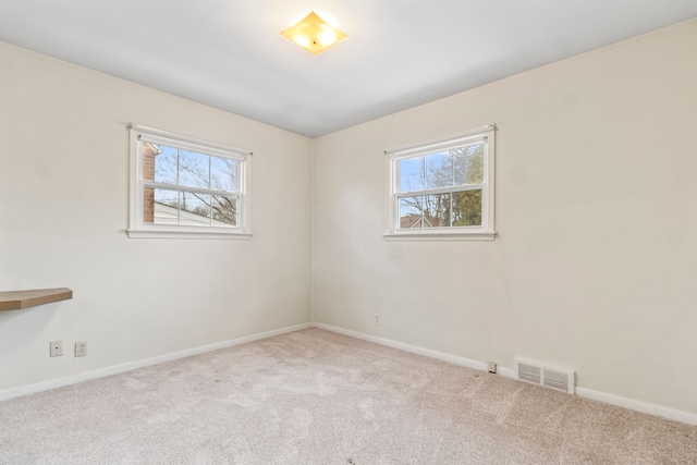 view of carpeted spare room