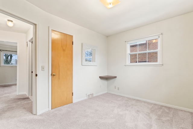 view of carpeted spare room