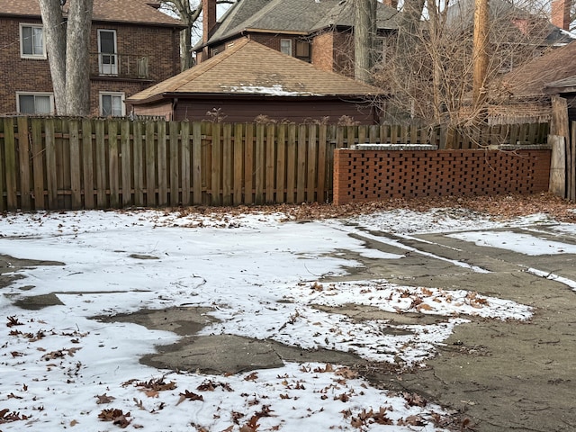 view of yard covered in snow