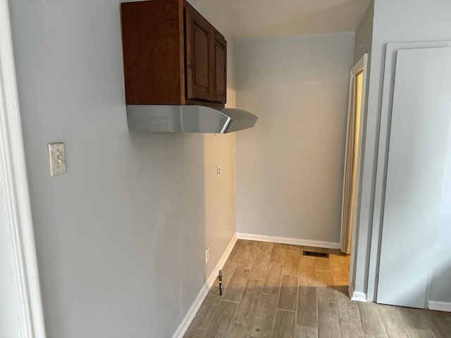 hallway featuring light hardwood / wood-style floors