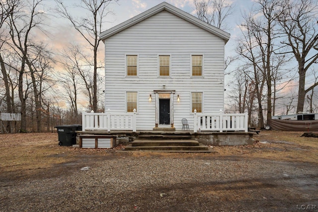 view of front of house featuring a wooden deck