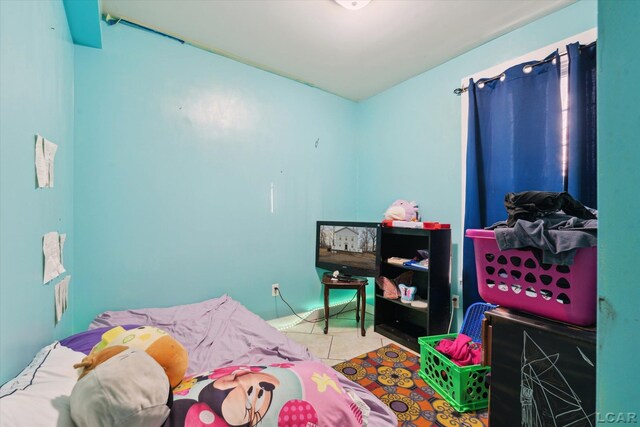 bedroom with tile patterned floors