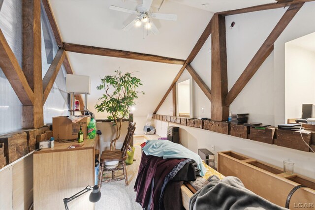 interior space with vaulted ceiling with beams