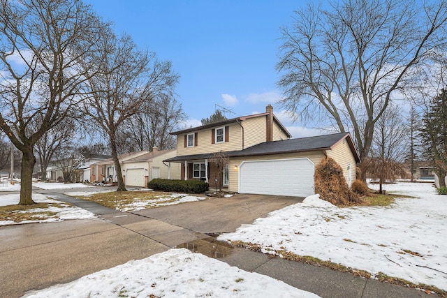 front of property with a garage