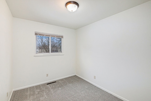 empty room with carpet floors