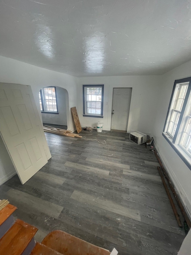 interior space with dark wood-type flooring