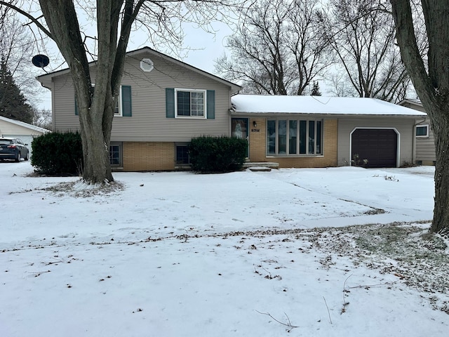 tri-level home featuring a garage