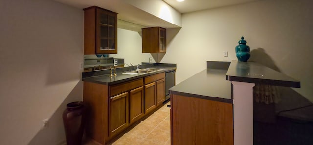 6713 Boulder Pointe Dr, Washington, MI 48094 - kitchen with dishwasher, a sink, glass insert cabinets, dark countertops, and brown cabinetry