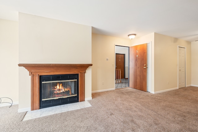 unfurnished living room with light carpet