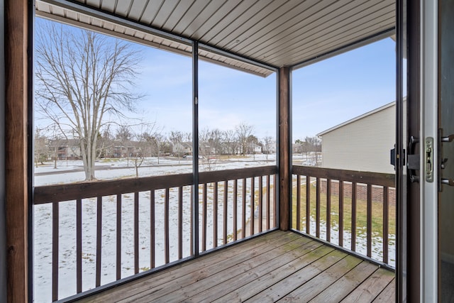 unfurnished sunroom with a wealth of natural light